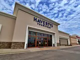 Exterior view of Haverty's building and parking area apart of Central Texas Marketplace