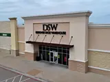 Exterior view of DSW building and parking area apart of Central Texas Marketplace