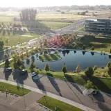 Exterior overhead view of pond and grassy area at Snake River Landing in Idaho Falls