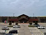 Exterior aerial view of Cabela's building and parking area apart of Central Texas Marketplace