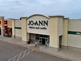 Exterior view of Joann building and parking area apart of Central Texas Marketplace